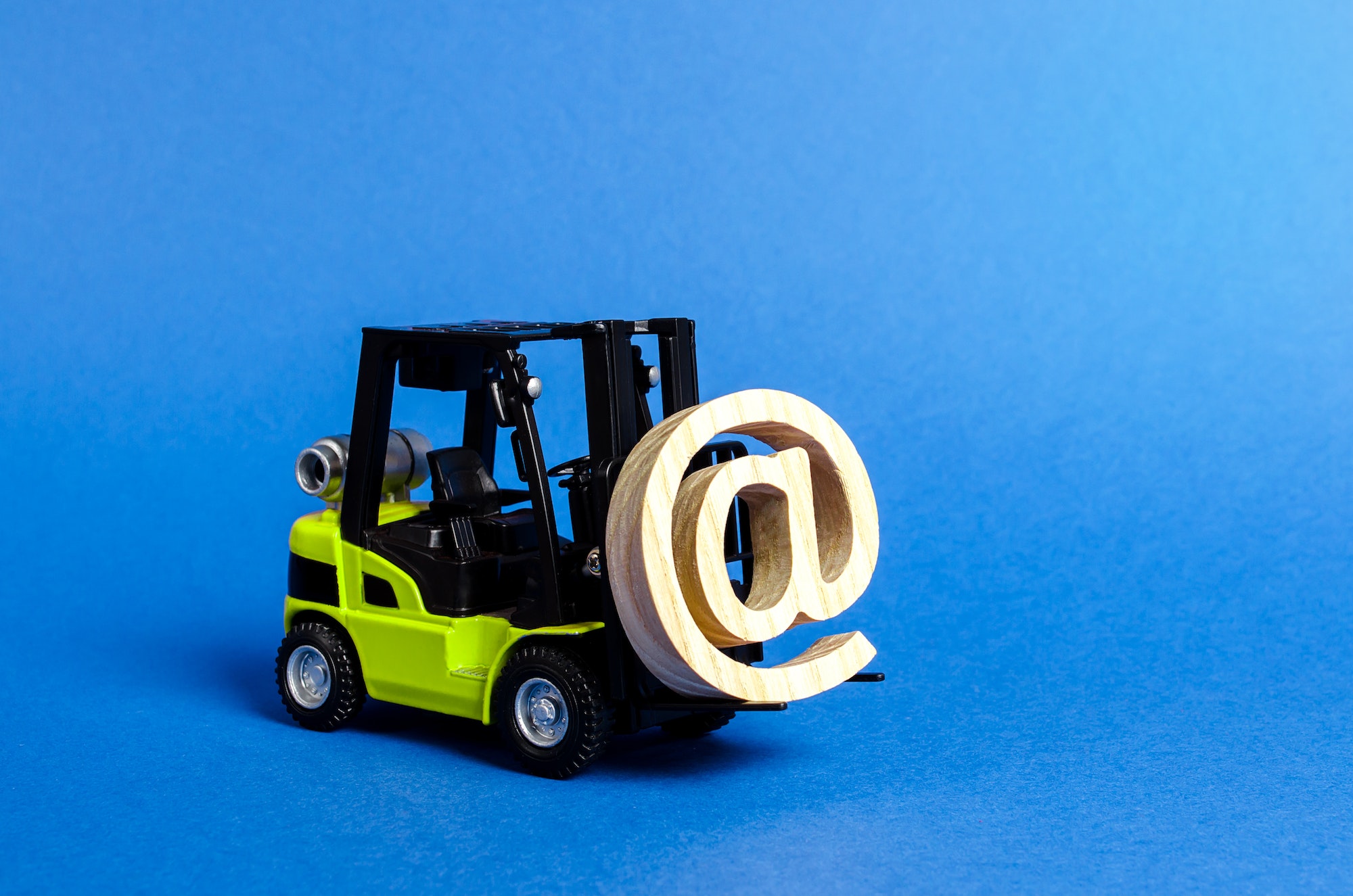 Green Forklift truck carry email symbol commercial AT